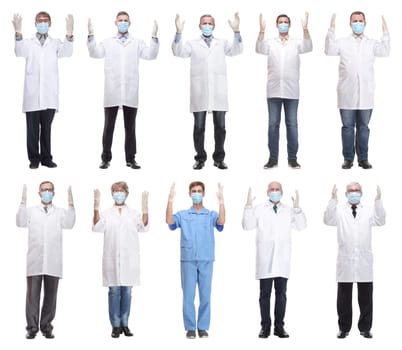 group of doctors in mask isolated on white background