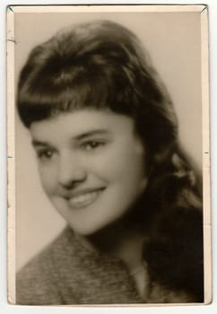 THE CZECHOSLOVAK SOCIALIST REPUBLIC - CIRCA 1960: Vintage photo shows young woman.