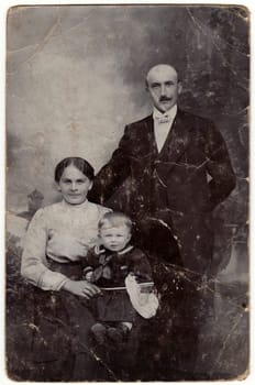 THE CZECHOSLOVAK REPUBLIC - CIRCA 1930s: Vintage photo shows family. Small boy wears child sailor costum.