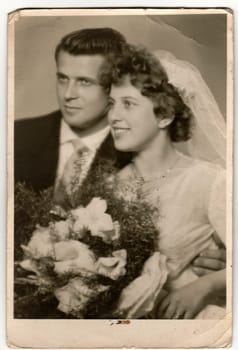 THE CZECHOSLOVAK SOCIALIST REPUBLIC - CIRCA 1970s: Vintage photo of newlyweds. Antique black & white photo.