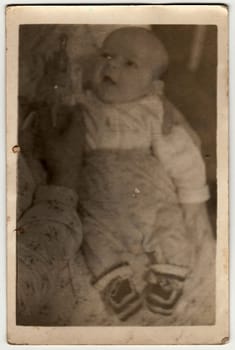 THE CZECHOSLOVAK SOCIALIST REPUBLIC - CIRCA 1960s: Vintage photo shows baby boy.