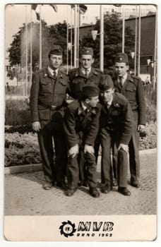 BRNO, THE CZECHOSLOVAK SOCIALIST REPUBLIC - 1962: Vintage photo shows soldiers visit Brno Trade Fairs and Exhibitions.