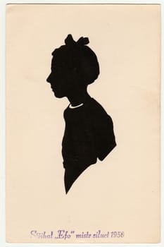 THE CZECHOSLOVAK SOCIALIST REPUBLIC - 1950: Vintage silhouette of girl. Text in Czech: Cut by "Efo" master of silhouettes 1950.