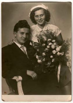 THE CZECHOSLOVAK SOCIALIST REPUBLIC - CIRCA 1950s: Vintage photo of newlyweds. An antique Black & White photo