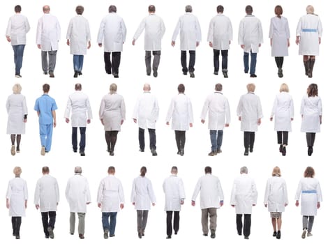 group of doctors in motion isolated on white background