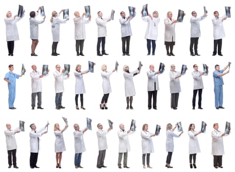 group of doctors holding x-ray isolated on white background