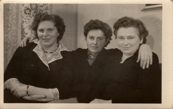 THE CZECHOSLOVAK SOCIALIST REPUBLIC - CIRCA 1960s: A vintage photo shows three women.