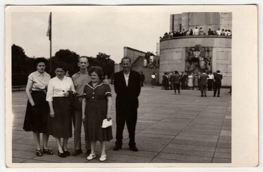 THE CZECHOSLOVAK SOCIALIST REPUBLIC - CIRCA 1970s: Vintage photo shows group of people stands in front of communist monument.