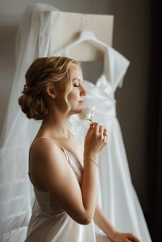 morning of the bride with the creation of the image of makeup and the creation of hairstyles