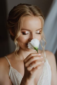 morning of the bride with the creation of the image of makeup and the creation of hairstyles