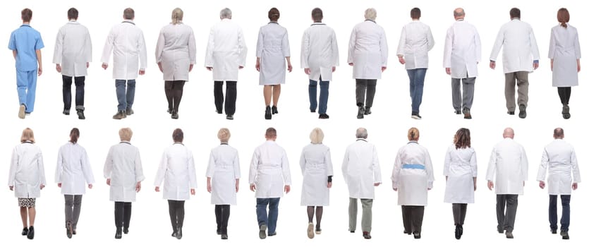 group of doctors in motion isolated on white background