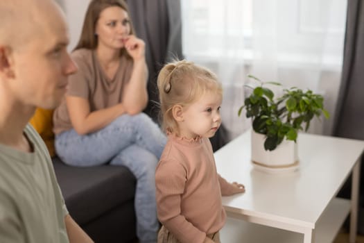 Deaf child girl with cochlear implant studying to hear sounds - recovery after cochlear Implant surgery and rehabilitation