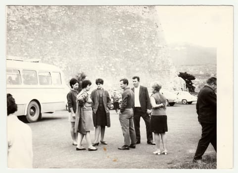 THE CZECHOSLOVAK SOCIALIST REPUBLIC - CIRCA 1970s: Vintage photo shows group of people during long bus trip.