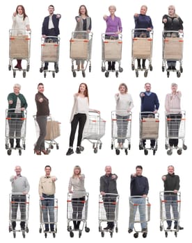 group of people with shopping cart showing thumbs up at camera isolated on white background
