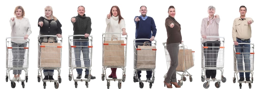 group of people with shopping cart showing thumbs up at camera isolated on white background