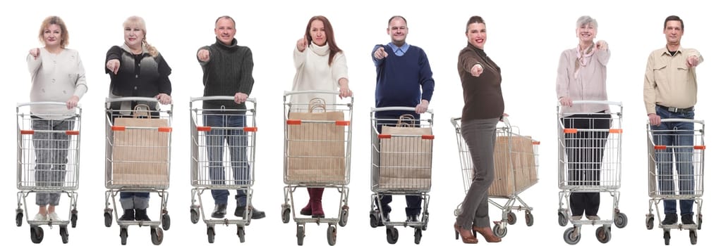 group of people with shopping cart showing thumbs up at camera isolated on white background