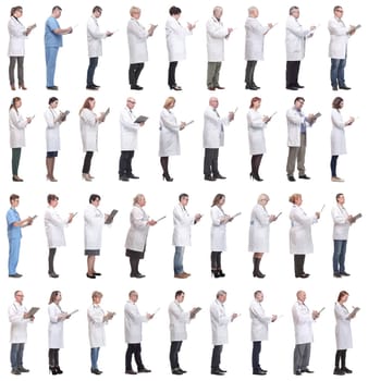 full length group of doctors with notepad isolated on white background