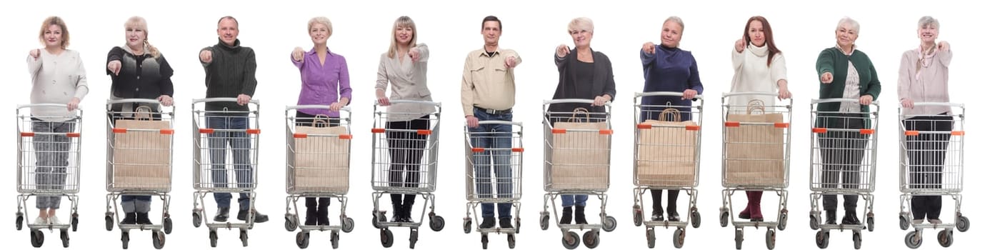 group of people with shopping cart showing thumbs up at camera isolated on white background