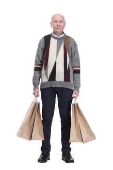 full-length. casual man with shopping bags. isolated on a white background.