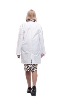 rear view. woman doctor in a white coat striding forward. isolated on a white background.