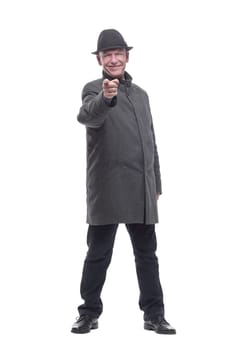 in full growth. intelligent man in a hat and autumn coat. isolated on a white background.