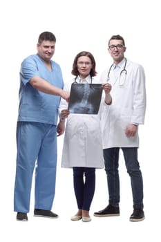 in full growth. medical colleagues discussing the x-ray. isolated on a white background.