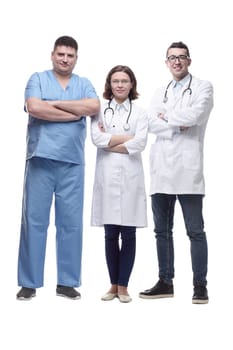 in full growth.a group of medical colleagues standing together. isolated on a white background.