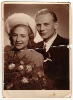 THE CZECHOSLOVAK SOCIALIST REPUBLIC - CIRCA 1960s: A vintage photo shows newlyweds. Antique Black & white photo.