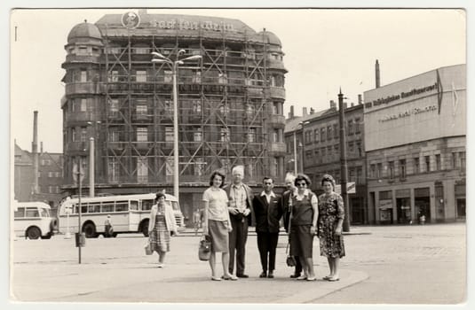 GERMANY - CIRCA 1960s: Vintage photo shows group of people in unknown town in Germany (GDR).