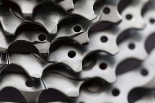 Mountain bike rear cassette macro shot closeup. Detail of gear wheel cluster of racing sports bike with speeds concept