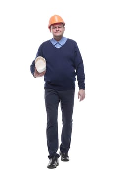 in full growth. male architect with drawings. isolated on a white background.