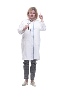 senior female doctor with a stethoscope in her hands. isolated on a white background.