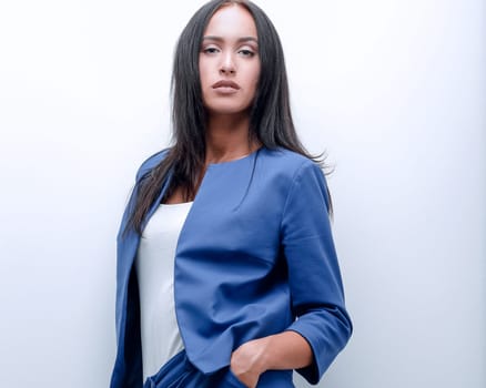 Portrait of a female with a serious face, woman in a jacket and shirt on a white background