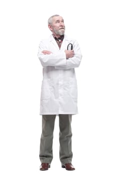 elderly competent doctor with a stethoscope in his hands. isolated on a white background.