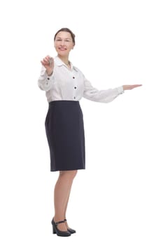 in full growth.business woman with keys in hand. isolated on a white background.