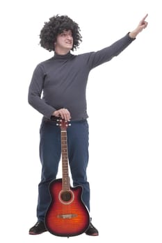 in full growth. curly-haired cheerful man with a guitar. isolated on a white background.