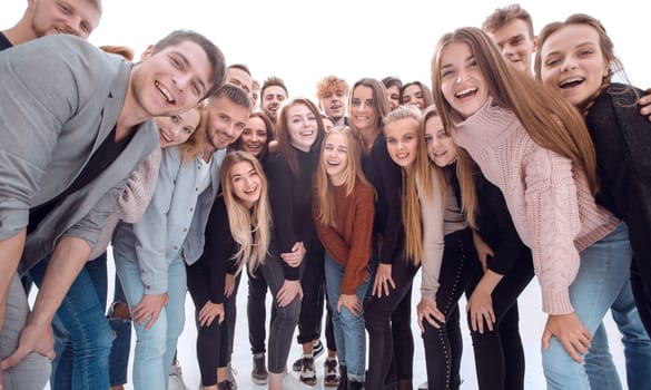 in full growth. a large group of confident young people standing together