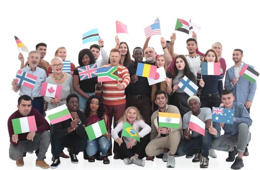 in full growth. funny diverse people with their national flags . isolated on a white background