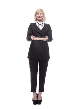 in full growth. attractive business woman with a gift box. isolated on a white background.