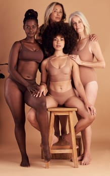 Beauty, diversity and portrait of body positive women, girl friends and senior woman relax together on studio background. Group solidarity, empowerment and confident lingerie people with self love.