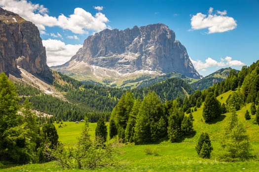 Idyllic landscape in Gardena pass valley and Sassolungo massif, italian Dolomites at springtime, Italy