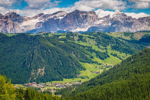 Idyllic landscape in Gardena pass valley and Sassolungo massif, italian Dolomites at springtime, Italy