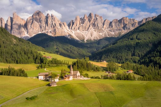 Santa Magdalena village in Val di Funes on the italian Dolomites at sunset, Italy