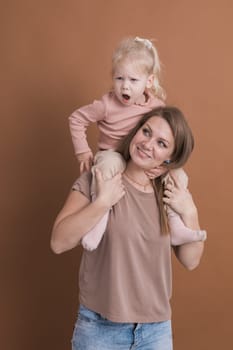 Deaf child girl with cochlear implant studying to hear sounds - recovery after cochlear Implant surgery and rehabilitation