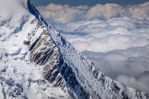 Mont blanc peak and massif, mountain climbing above glaciers, French Alps, France