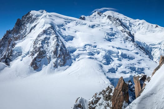 Mont blanc peak and massif, mountain climbing above glaciers, French Alps, France