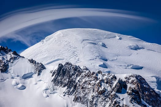 Mont blanc peak and massif, mountain climbing above glaciers, French Alps, France