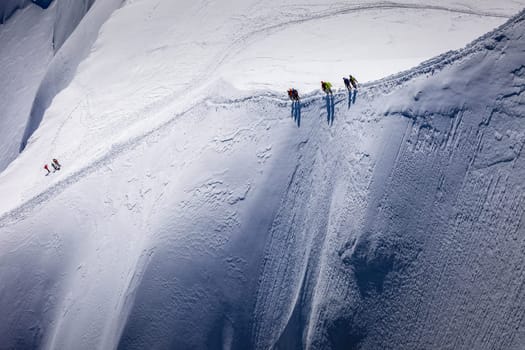 Mont blanc peak and massif, mountain climbing above glaciers, French Alps, France