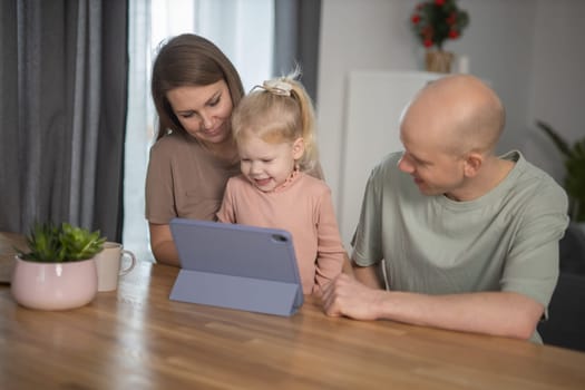 Deaf child girl with cochlear implant studying to hear sounds - recovery after cochlear Implant surgery and rehabilitation