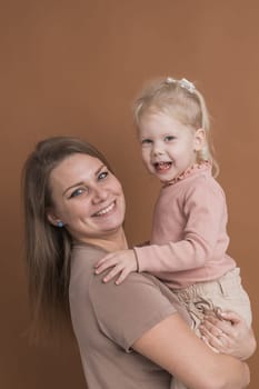 Deaf child girl with cochlear implant studying to hear sounds - recovery after cochlear Implant surgery and rehabilitation